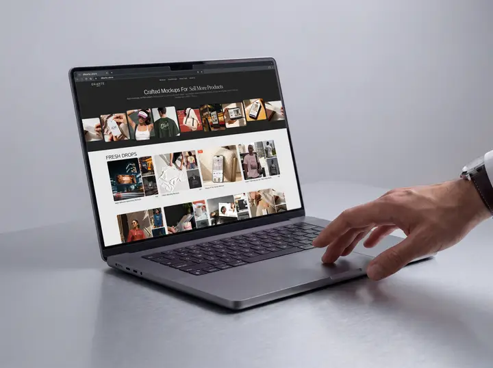MacBook Mockup with Hand and Aluminum Table