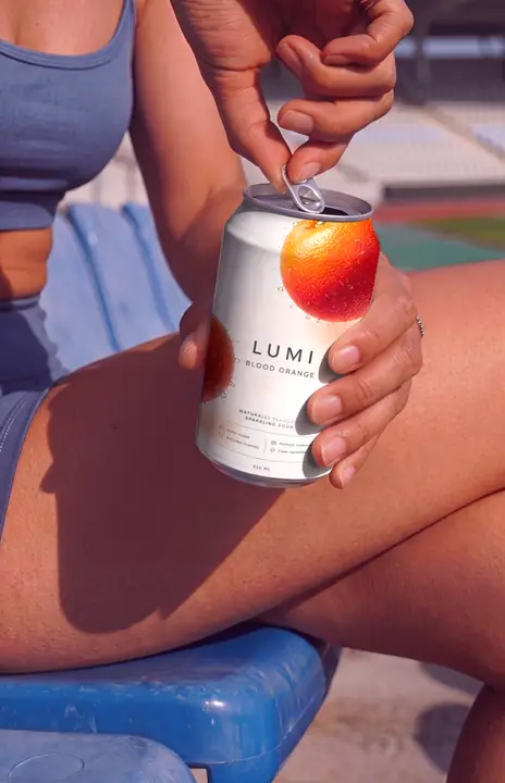 Soda Can Mockup Opening by a Sporty Woman